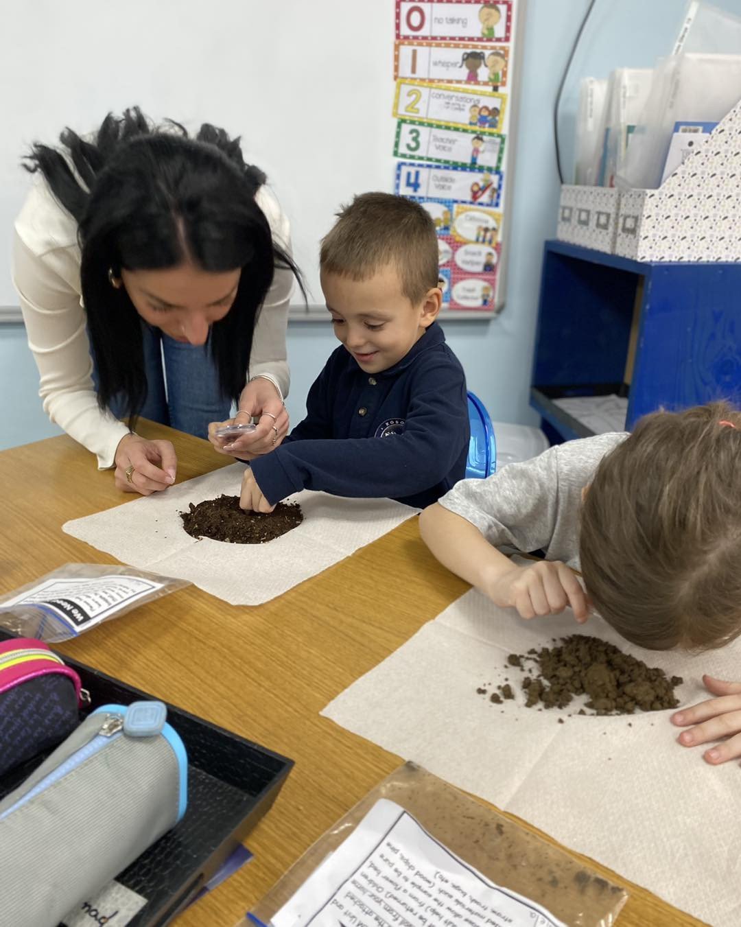 Kindergarteners exploring the soil